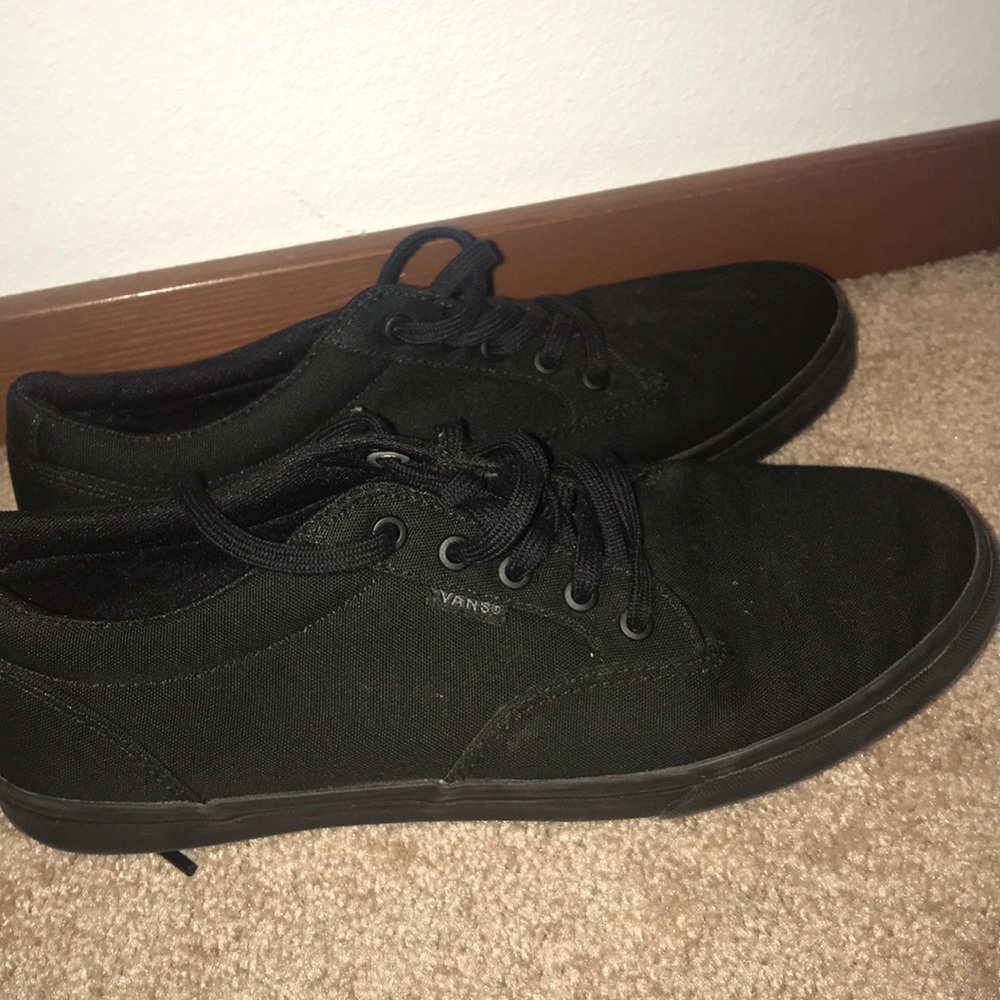All black lace up vans.